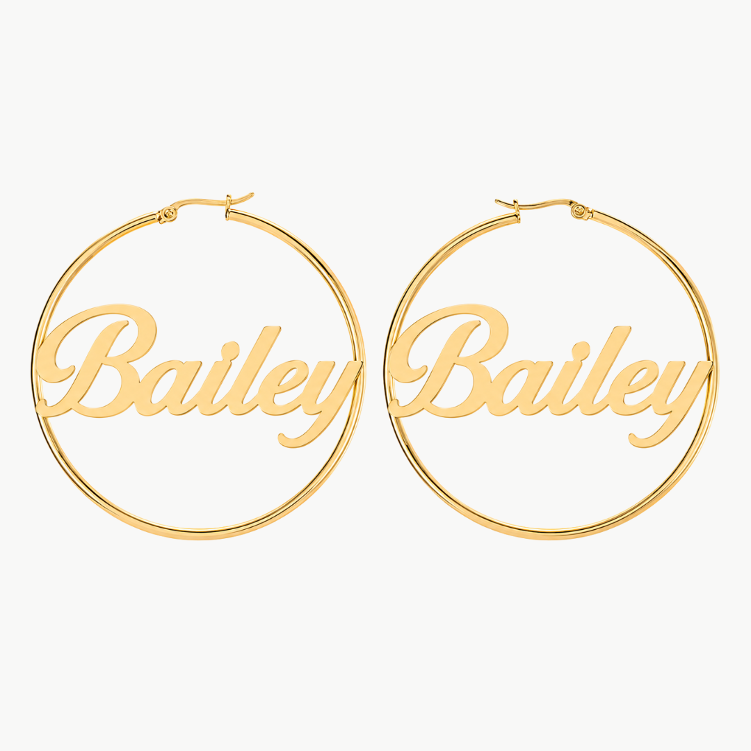 Personalized name hoop earrings in gold with script lettering