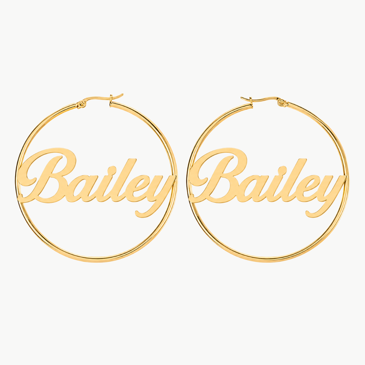 Personalized name hoop earrings in gold with script lettering