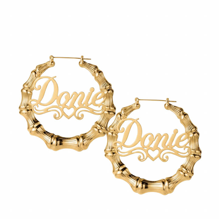 Personalized gold bamboo name hoop earrings with custom script name and heart flourish
